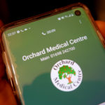A mobile phone showing an open call to the Medical Centre
